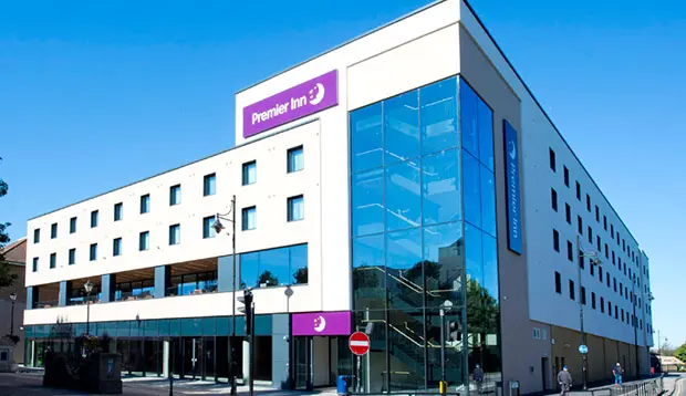 Staines Premier Inn with modern curtain wall facade and aluminum windows installed by Hardman Ventures Ltd